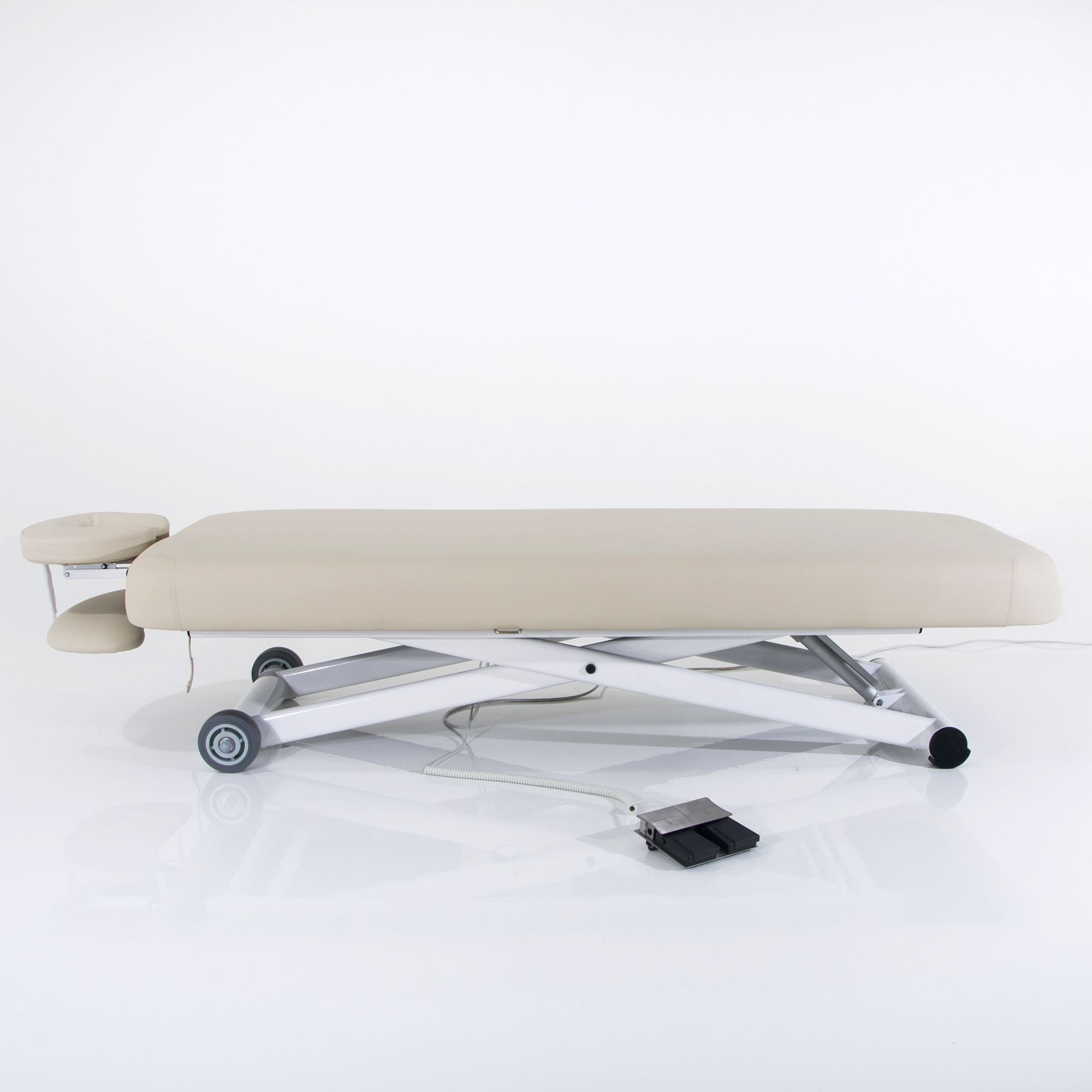 Silverfox America 2274 electric massage table with adjustable headrest and foot pedal.