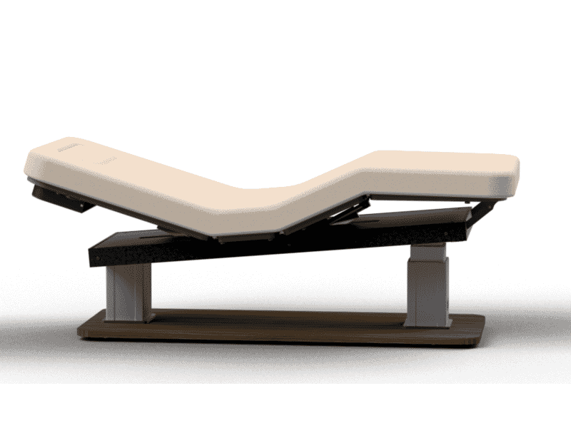 Oakworks Spa PALAS Table: cream cushion, dark base, adjustable breast comfort.