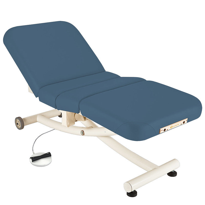 EarthLite ELLORA VISTA Full Electric Salon Table with salon headrest, white frame, and wheels.
