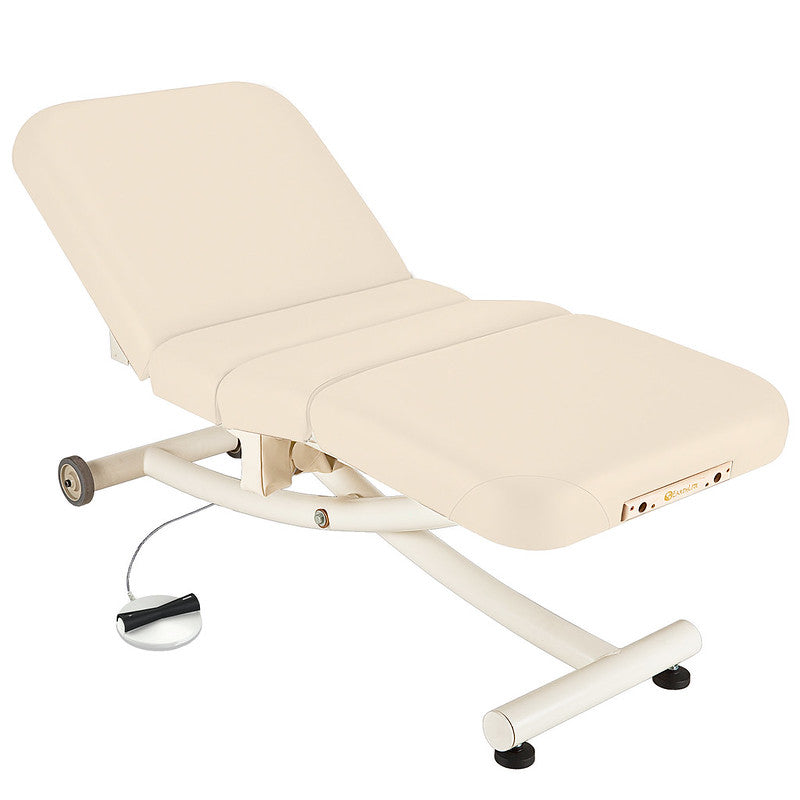 EarthLite Ellora Vista Full Electric Salon Table with wheels and foot pedal, beige.