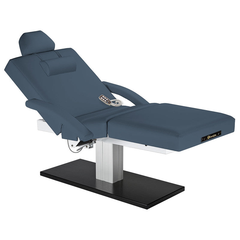 EarthLite Everest SPA Salon electric table, blue, with headrest and remote on a black base.