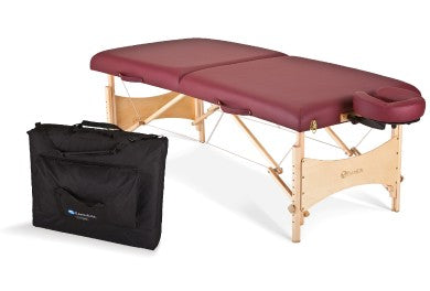 Custom Craftworks ATHENA massage table with maroon padding, wood frame, and black case shown.