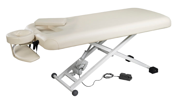 Nirvana Electric Massage Table with face cradle and foot pedal on a white background.