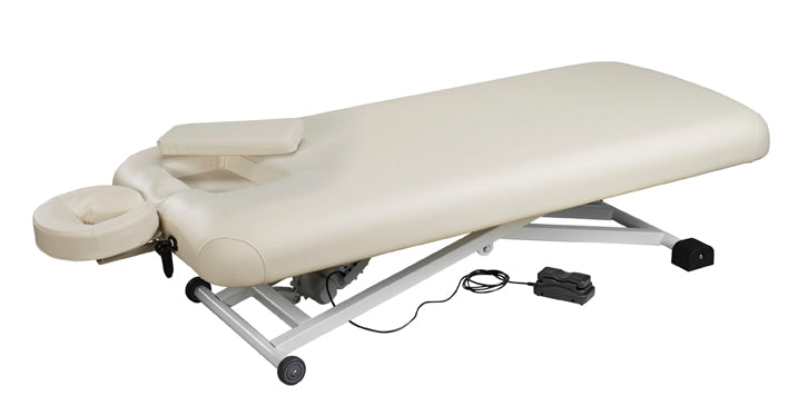 Nirvana Electric Massage Table in beige with face cradle, headrest, and electric controls.