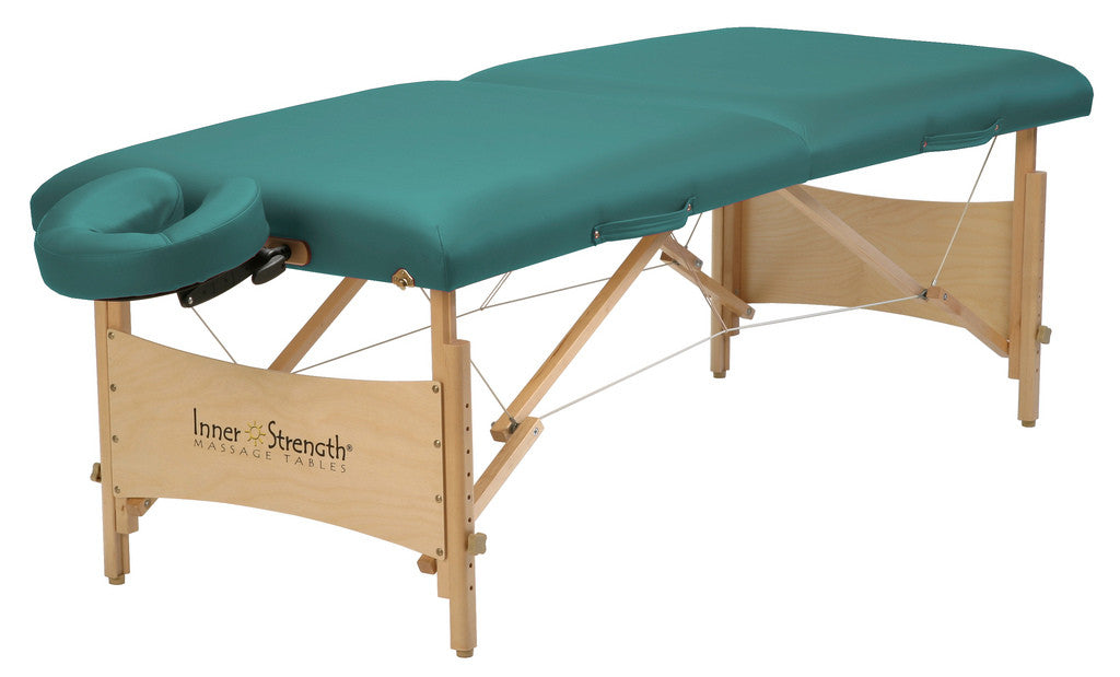 Inner Strength ELEMENT teal portable massage table with hardwood legs and face cradle.