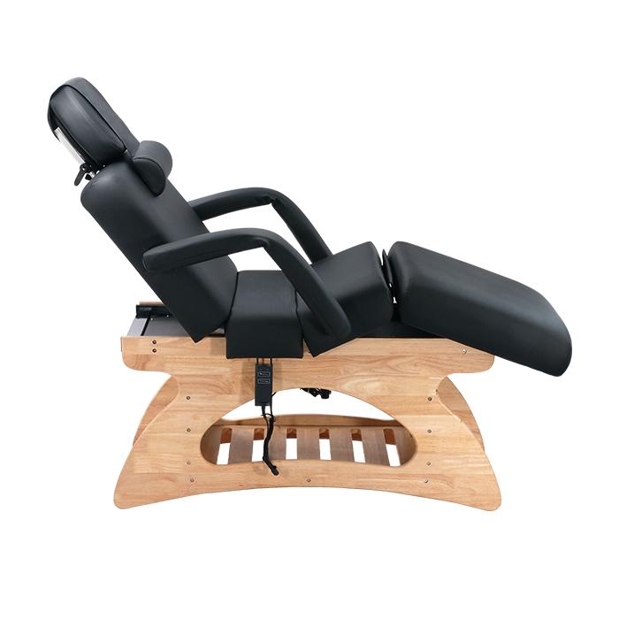 Comfort Soul SOLARA ELITE stationary table, black, solid oak base, reclined side view.