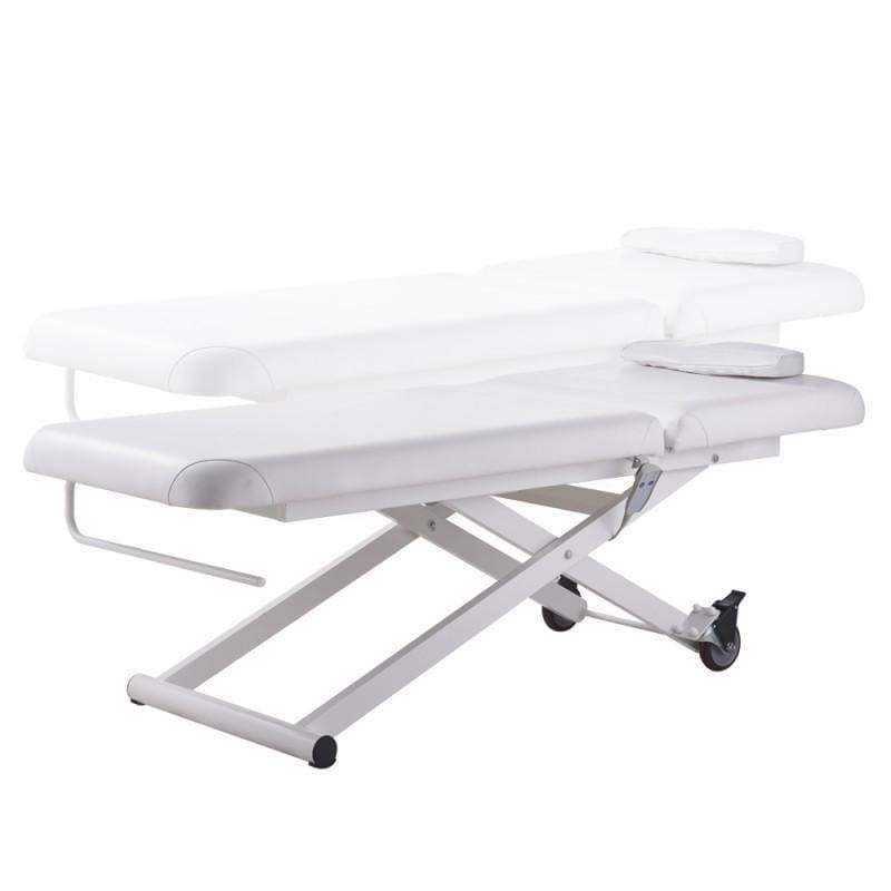 Ebro Electric Facial Bed by DIR shown at two heights with headrest and metal frame.