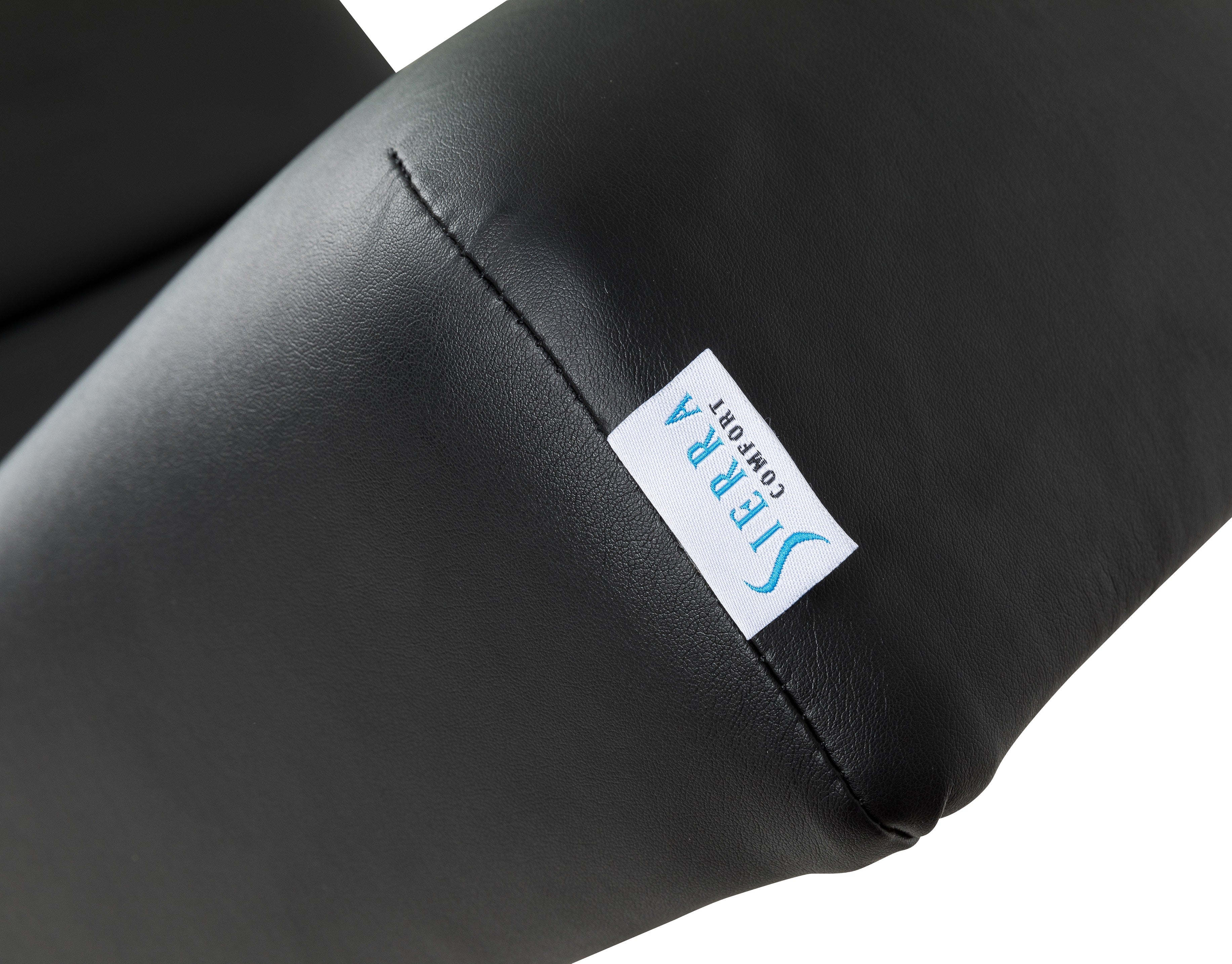 Close-up of black leather on the Sierra Comfort Electric Lift Massage Table upholstery.