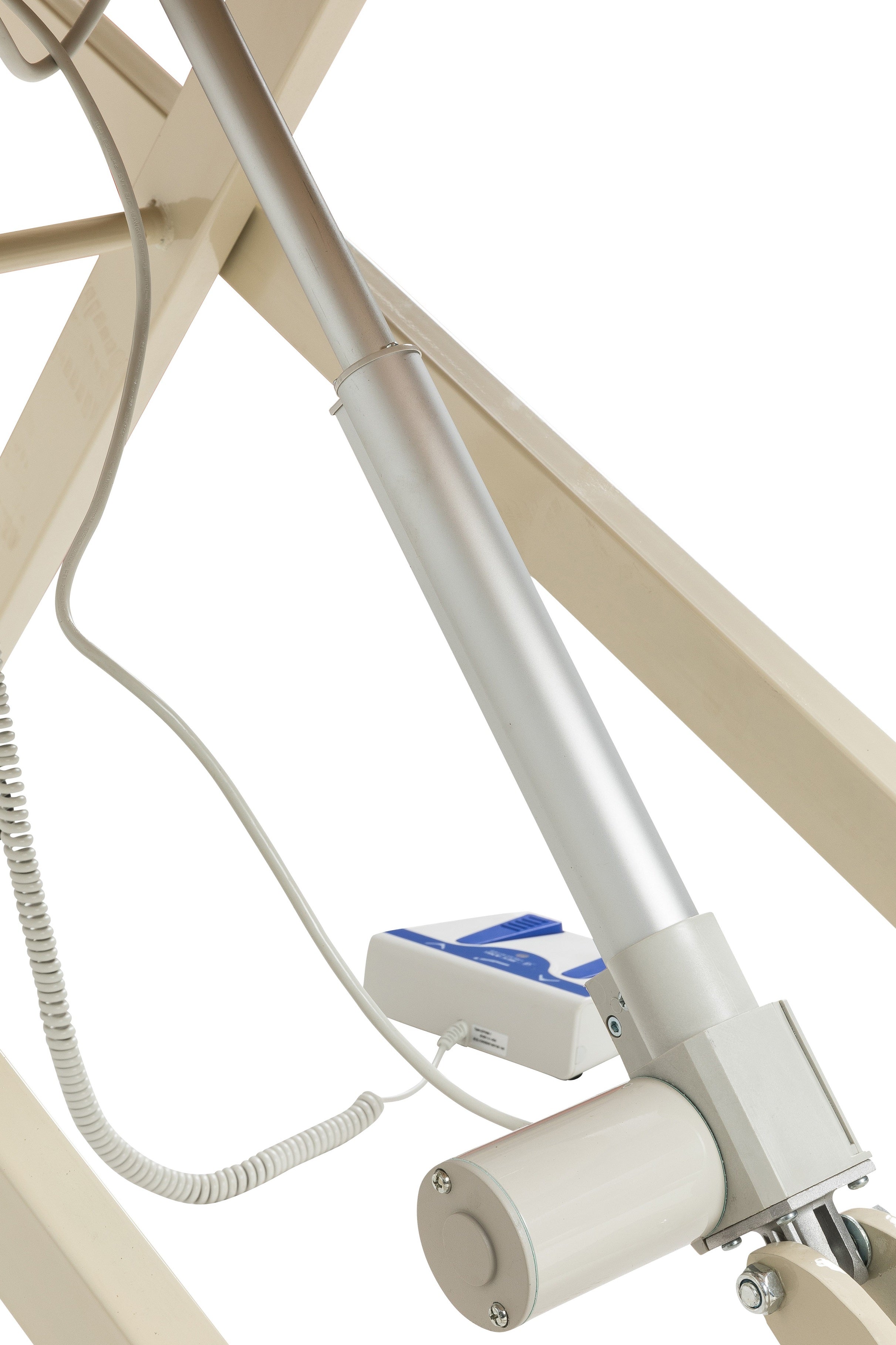 Close-up of Sierra Comfort Electric Lift Massage Table actuator with wiring on beige frame.
