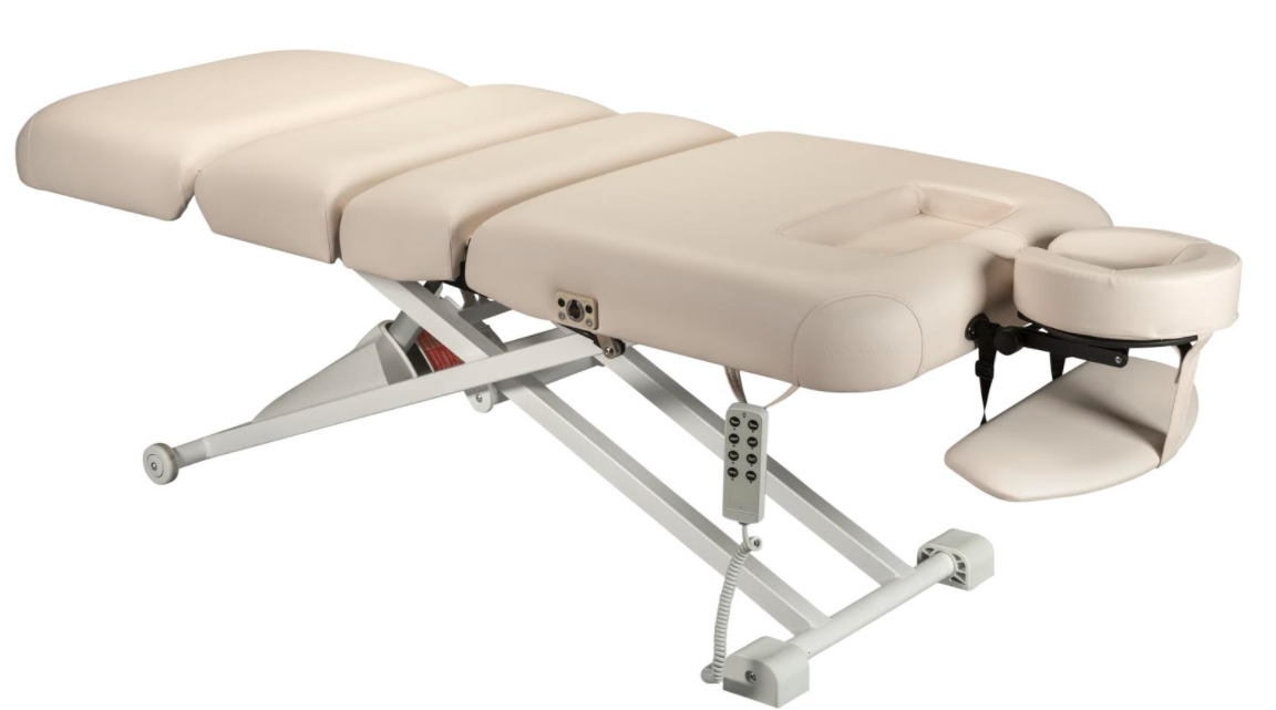 Nirvana Salon Top Electric Massage Table by Nirvana, beige and adjustable for salon use.