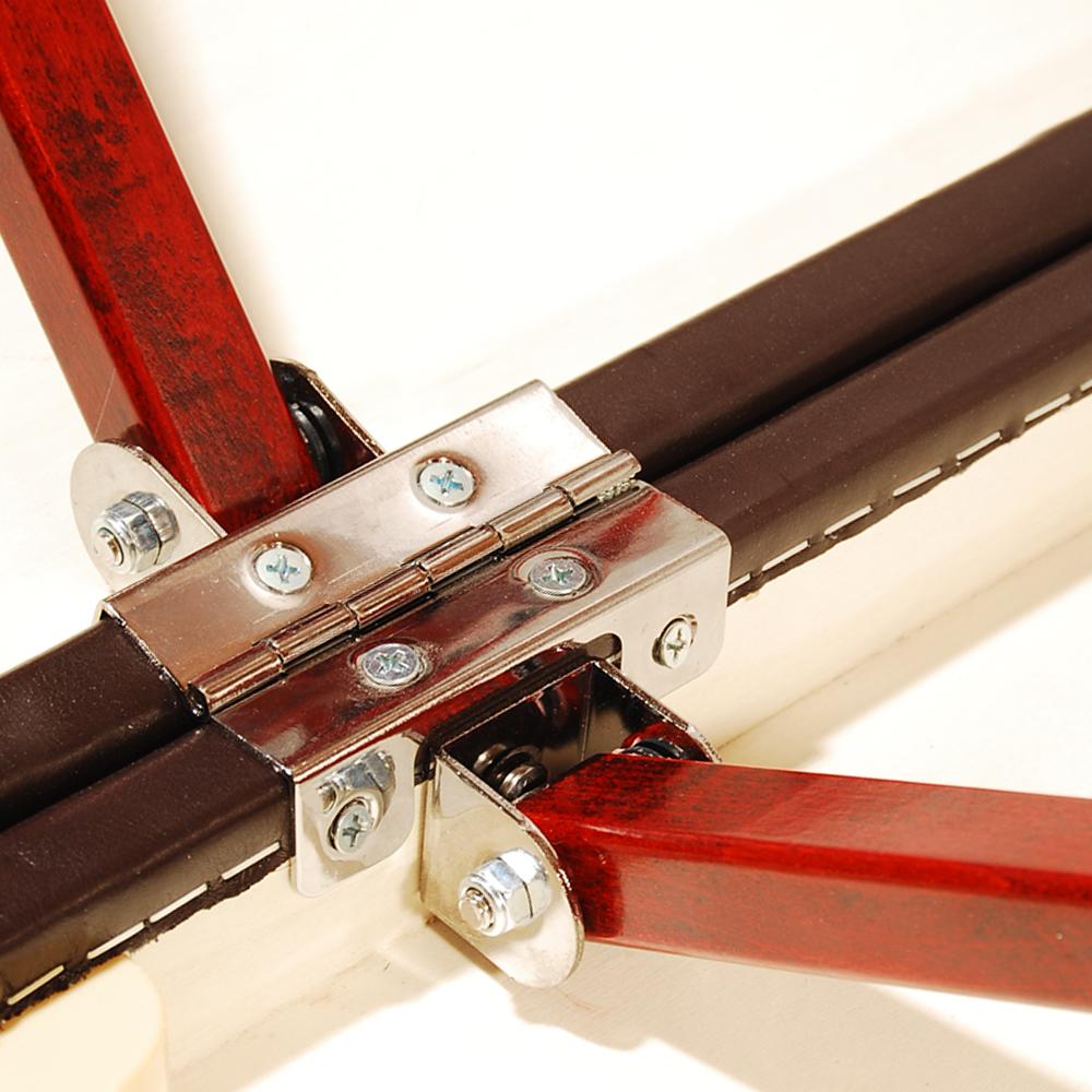 Close-up of hinge with screws on Master Massage CARLYLE LX Portable Massage Table.
