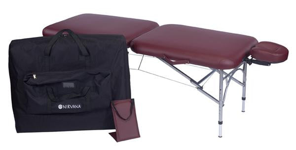 Nirvana DHARMA SuperLite maroon massage table with aluminum legs, headrest, and carry bag.