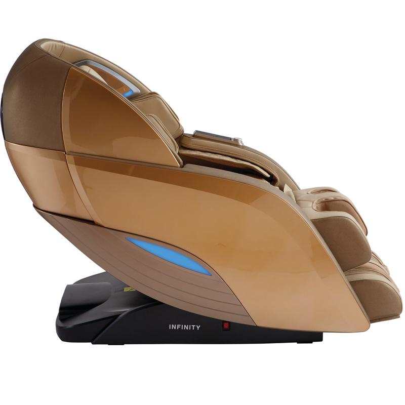 Side view of Infinity DYNASTY 4D tan and brown massage chair with Infinity branding on base.