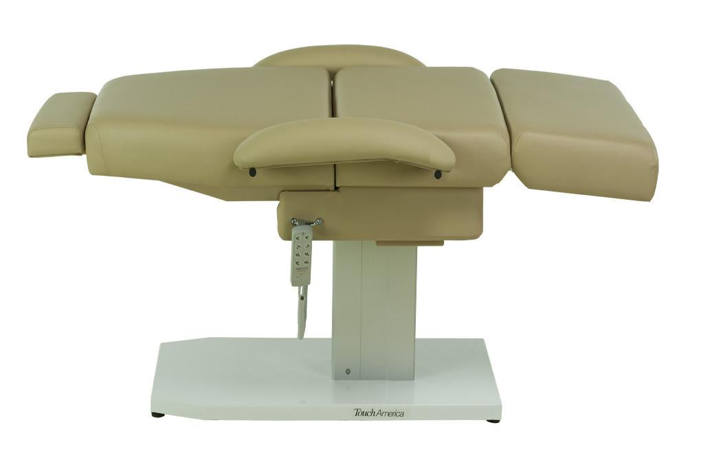 TouchAmerica EMPRESS beige adjustable spa chair on white base with control panel.