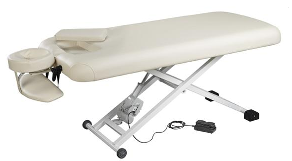 Nirvana Electric Massage Table with face cradle and remote foot pedal for spa treatments.