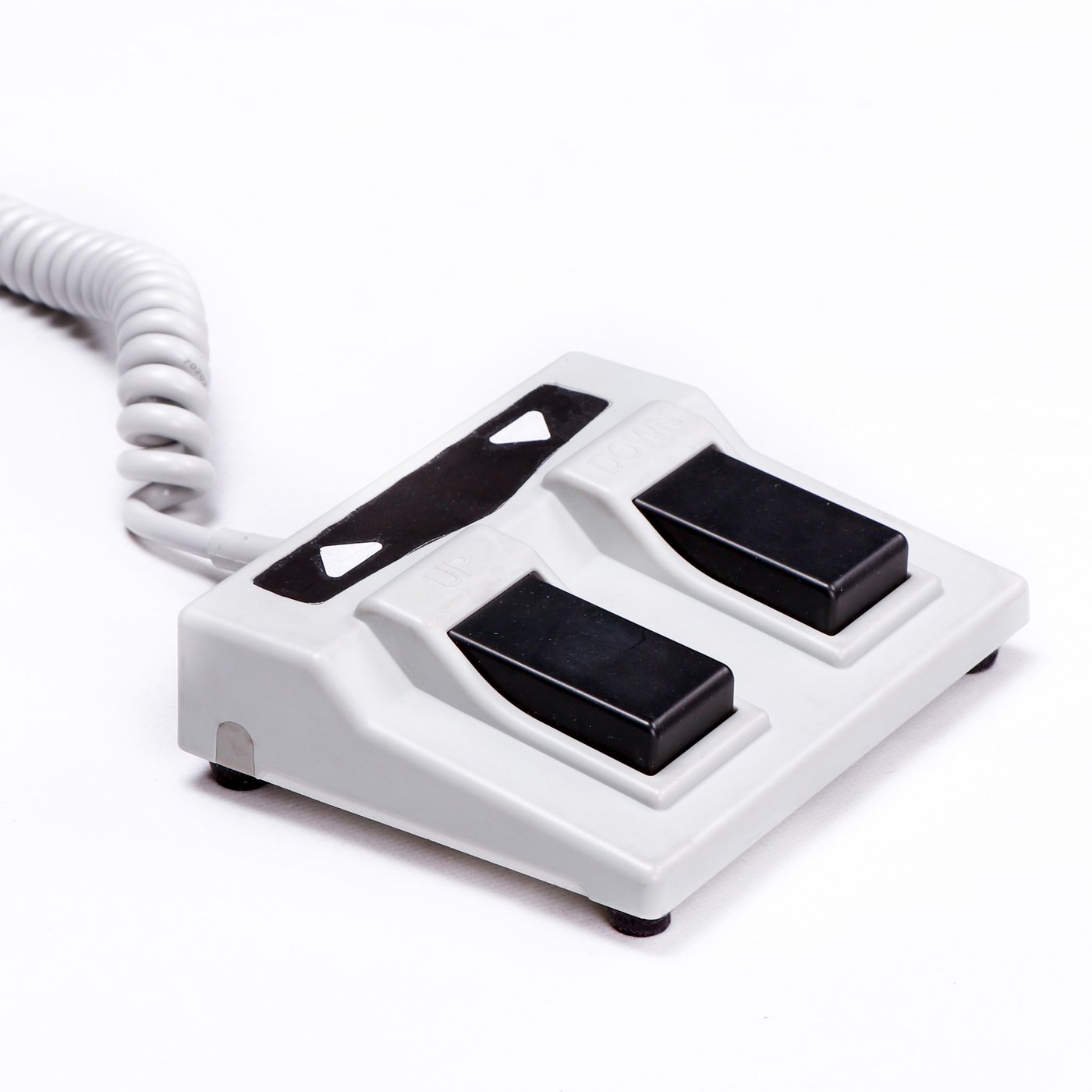 White two-button foot pedal with coiled cord for Master Massage TheraMaster Powerlift Table.