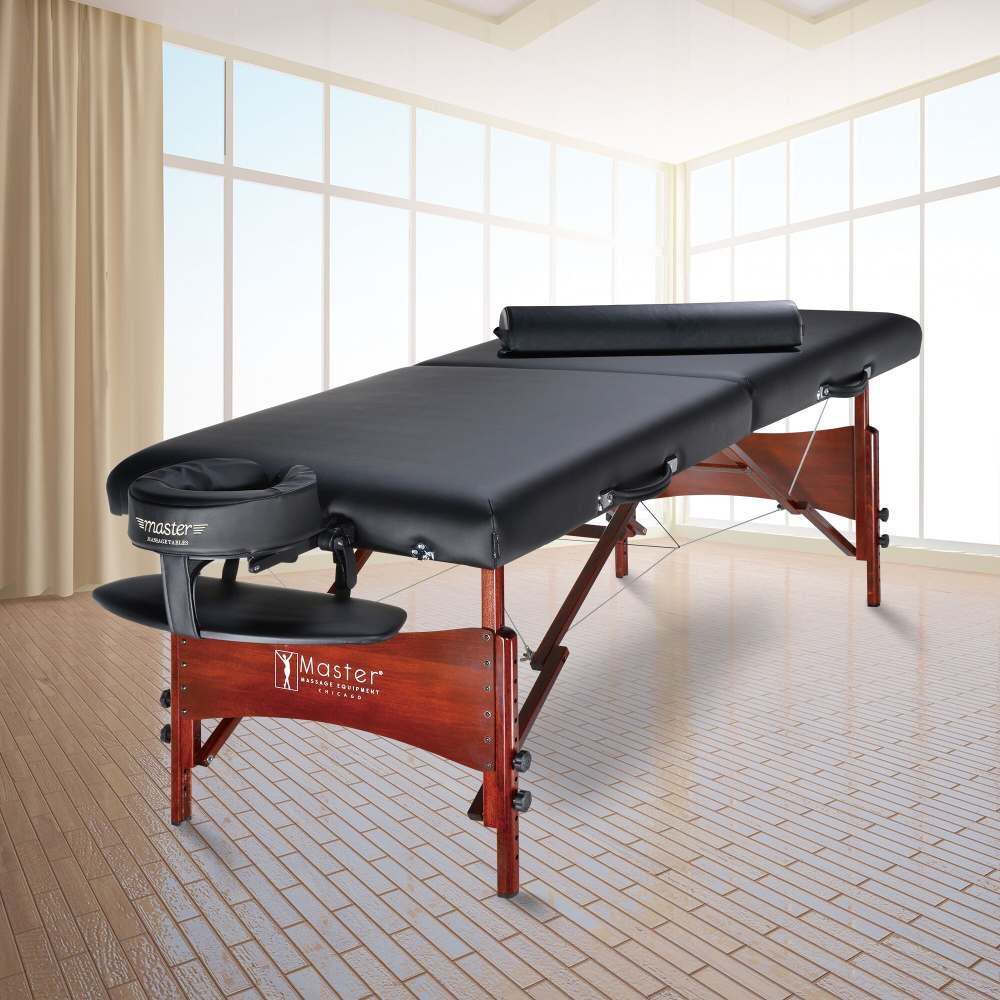 Master Massage Roma II Portable Massage Table Package in a bright, spacious room.