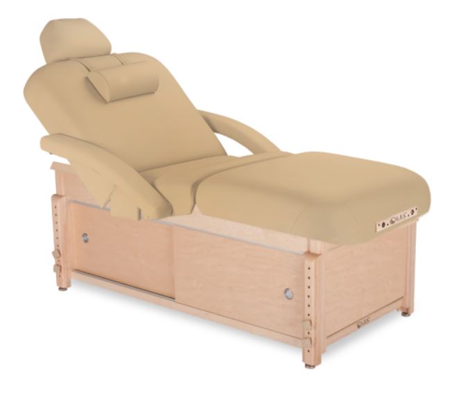 SONOMA beige spa table by Living Earth Crafts with cabinet base, headrest, and tilt assist.