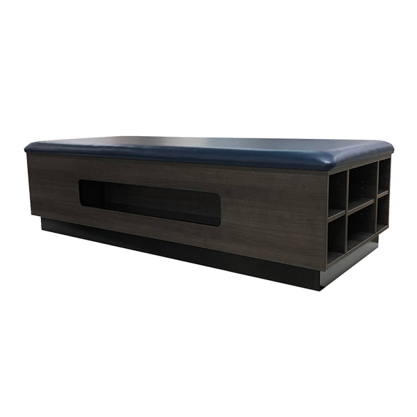 PHS Medical Deluxe Stretch Table by PHS Medical with foam top, wood base, and cubby storage.