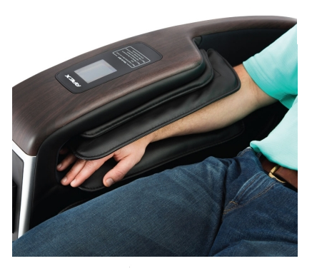 Someone uses the Apex V1 Vending Massage Chair with electronic arm massage.