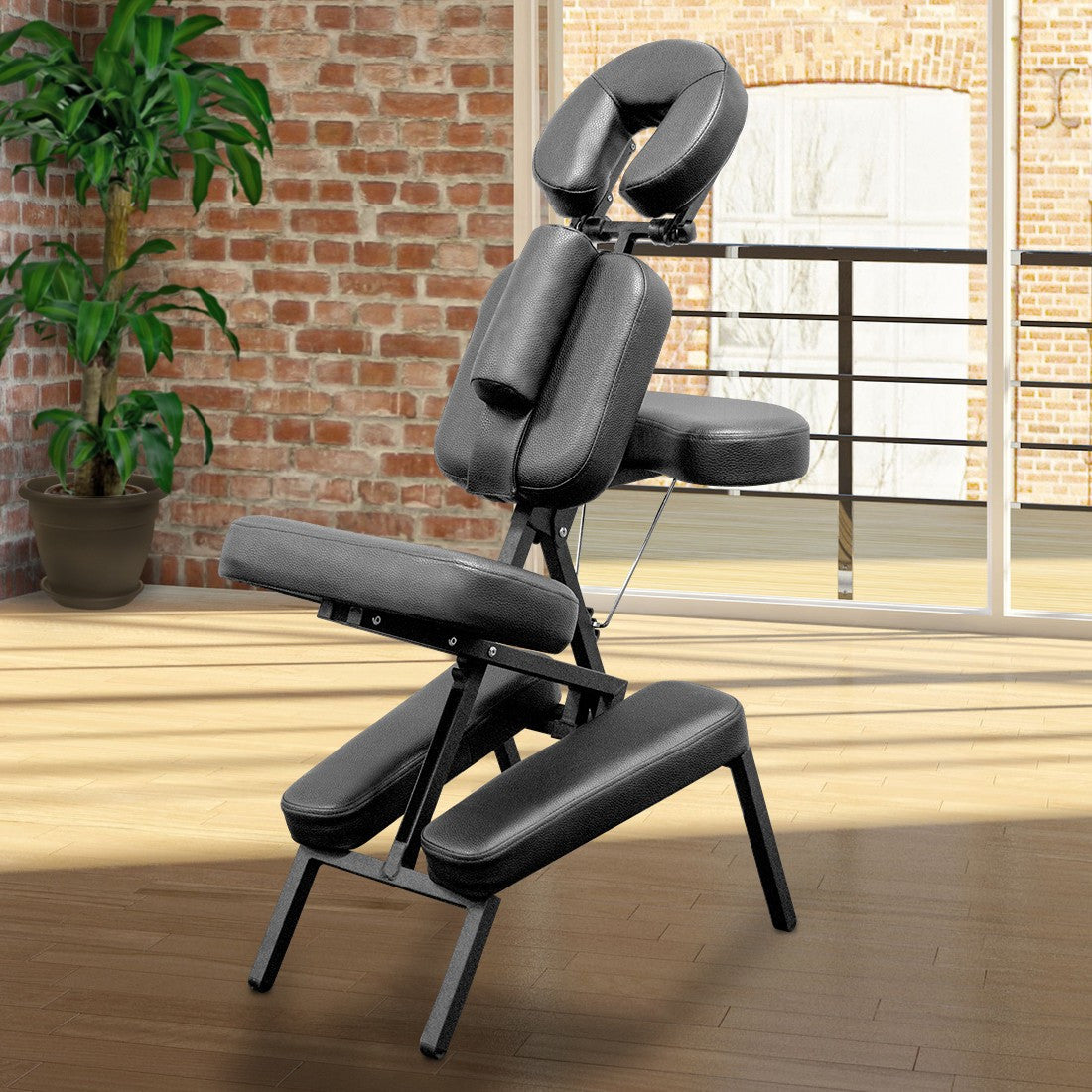 Master Massage APOLLO XXL Portable Chair with heavy-duty upholstery in a sunlit room.