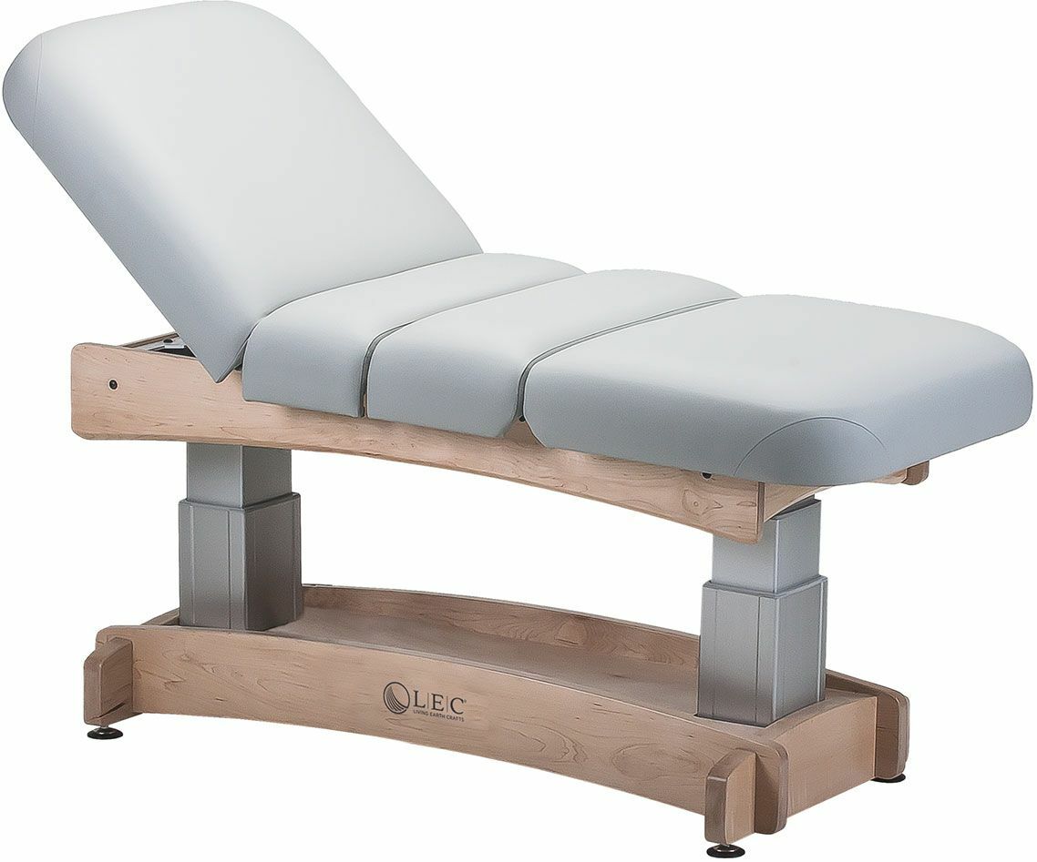 Living Earth Crafts ASPEN Salon Top Spa Table with light wood base and gray memory foam cushioning.