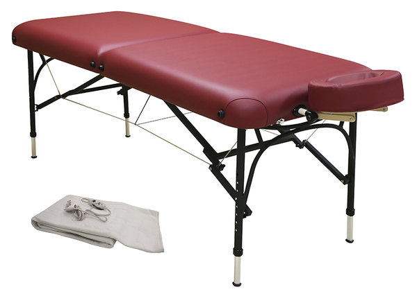Custom Craftworks CHALLENGER aluminum massage table with face cradle, white sheet set beside it.