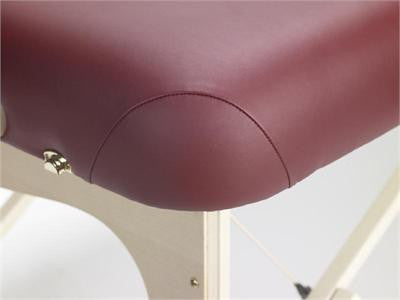 Close-up of the contoured burgundy corner on the Nirvana 2n1 Portable Massage Table Package.