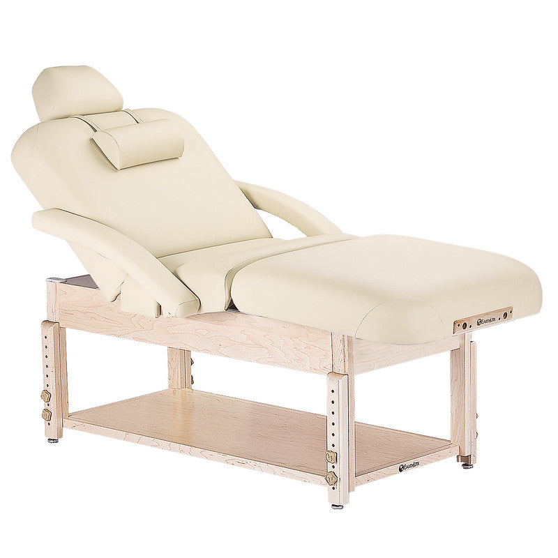 EarthLite Sedona Salon pneumatic massage table, beige, with cushioned headrest and shelf.