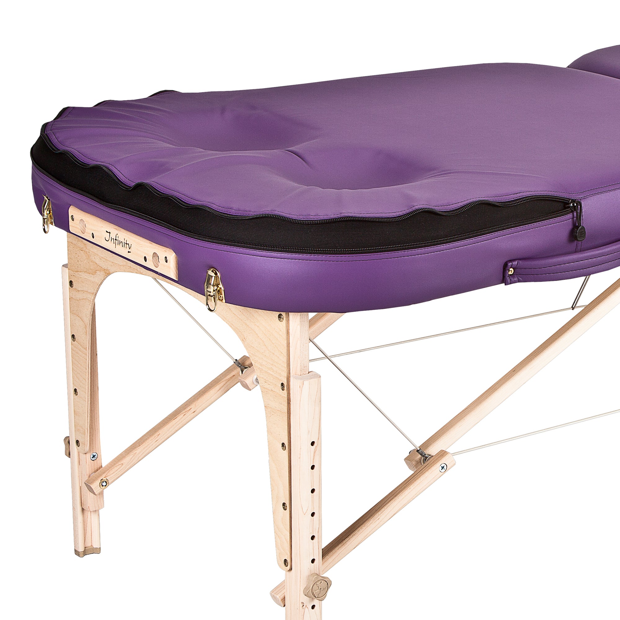 EarthLite INFINITY CONFORMA massage table with wooden legs and headrest, shown at an angle.