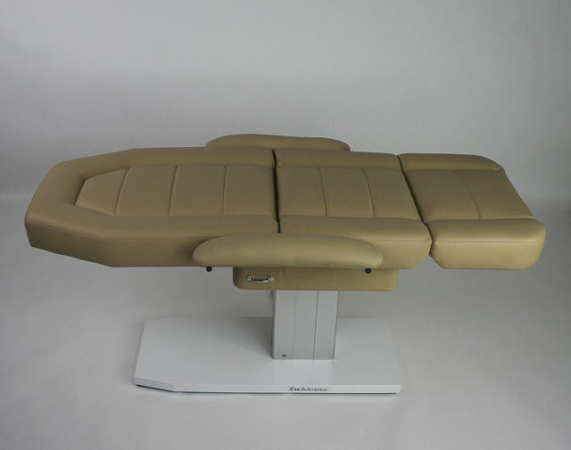 TouchAmerica MARIMBA Treatment Chair/Table, adjustable, shown in beige on a white background.