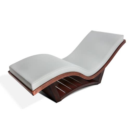Living Earth Crafts NuWave S™ Lounger features a curved hardwood base and cushioned seat.