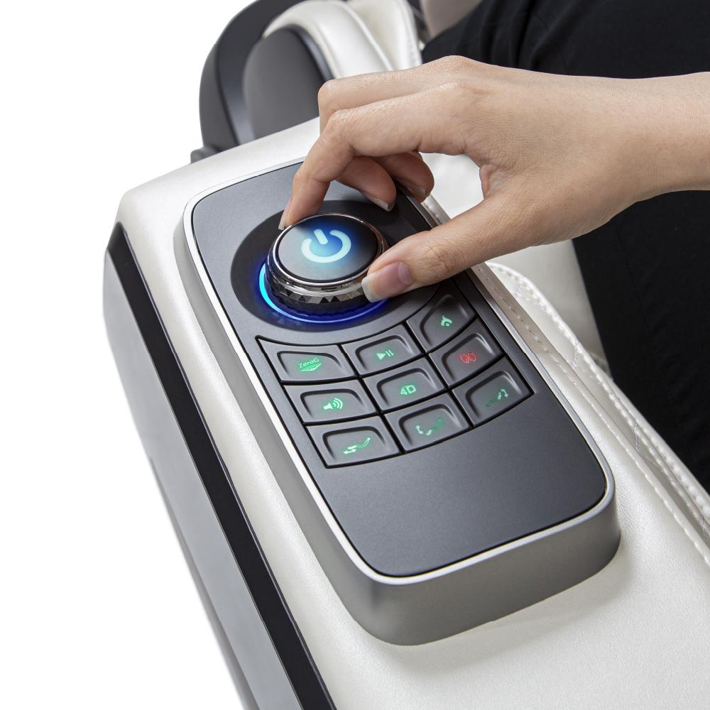 Hand adjusts Osaki Otamic 4D Sedona LT chair's lit control panel on armrest.