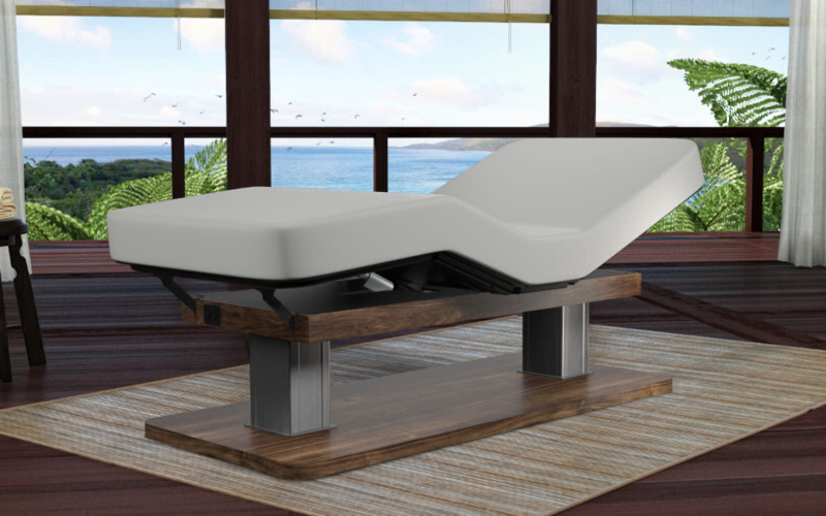 Oakworks Spa PALAS Master's Collection Table in modern room with ocean view through windows.