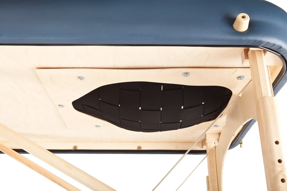 Underside of EarthLite SPIRIT PREGNANCY table with black webbing and wooden frame shown.