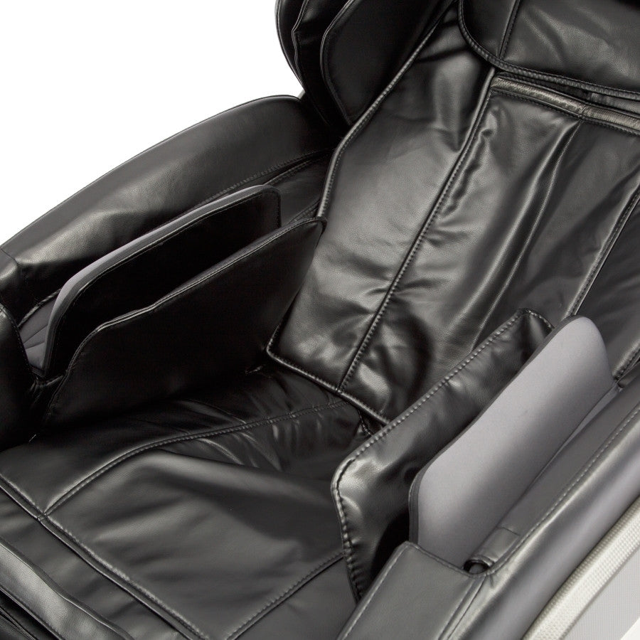 Close-up of Titan OS-Pro SUMMIT Massage Chair in black, highlighting seat and armrests.