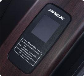 Close-up of an Apex V2 Vending Massage Chair control panel with screen and instructions.