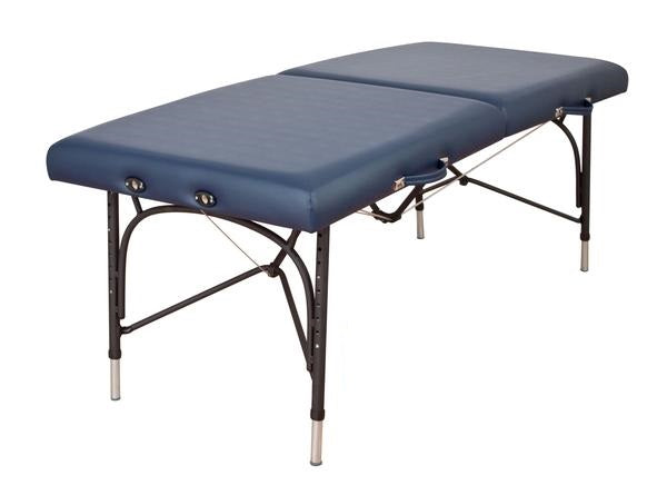 Oakworks WELLSPRING portable massage table with blue padding and black metal legs.