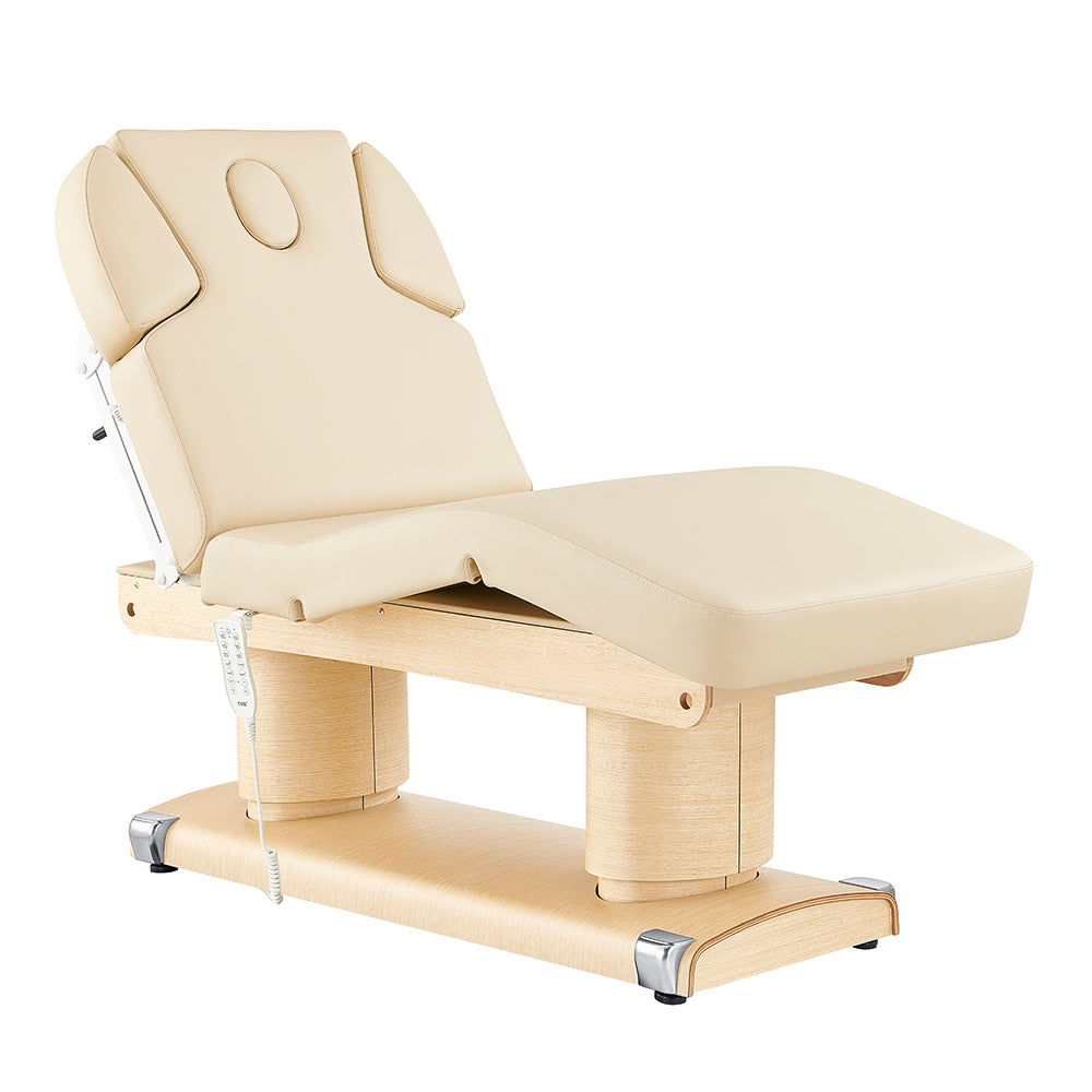 Luxi 4 Motors Spa Table by DIR in beige with headrest, remote, and wooden base.