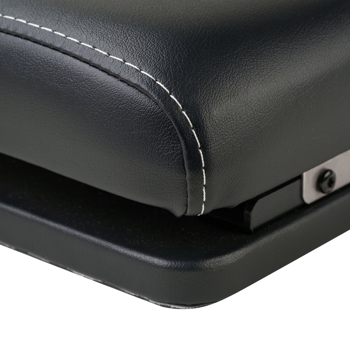 Close-up of a black leather chiro tool with stitching detail on a white background