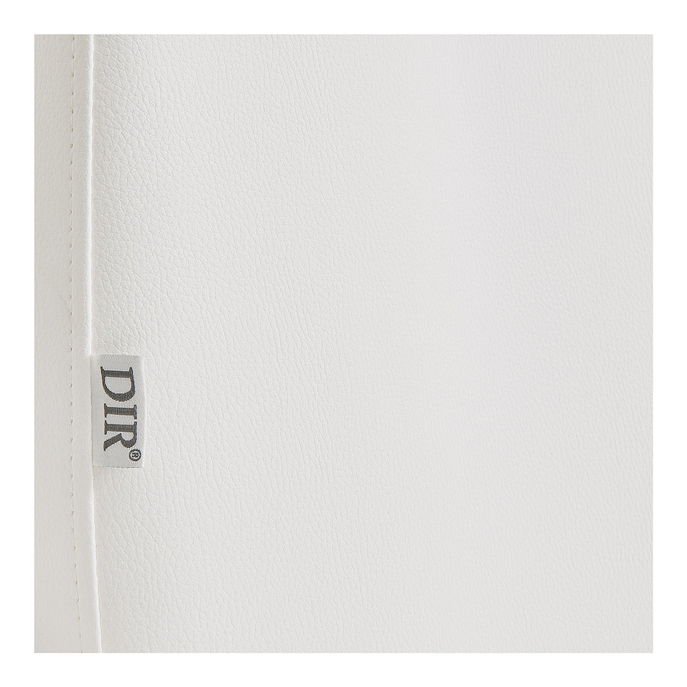 Close-up of the DIR Sydney Medical Chair’s white textured surface with a small DIR fabric tag.