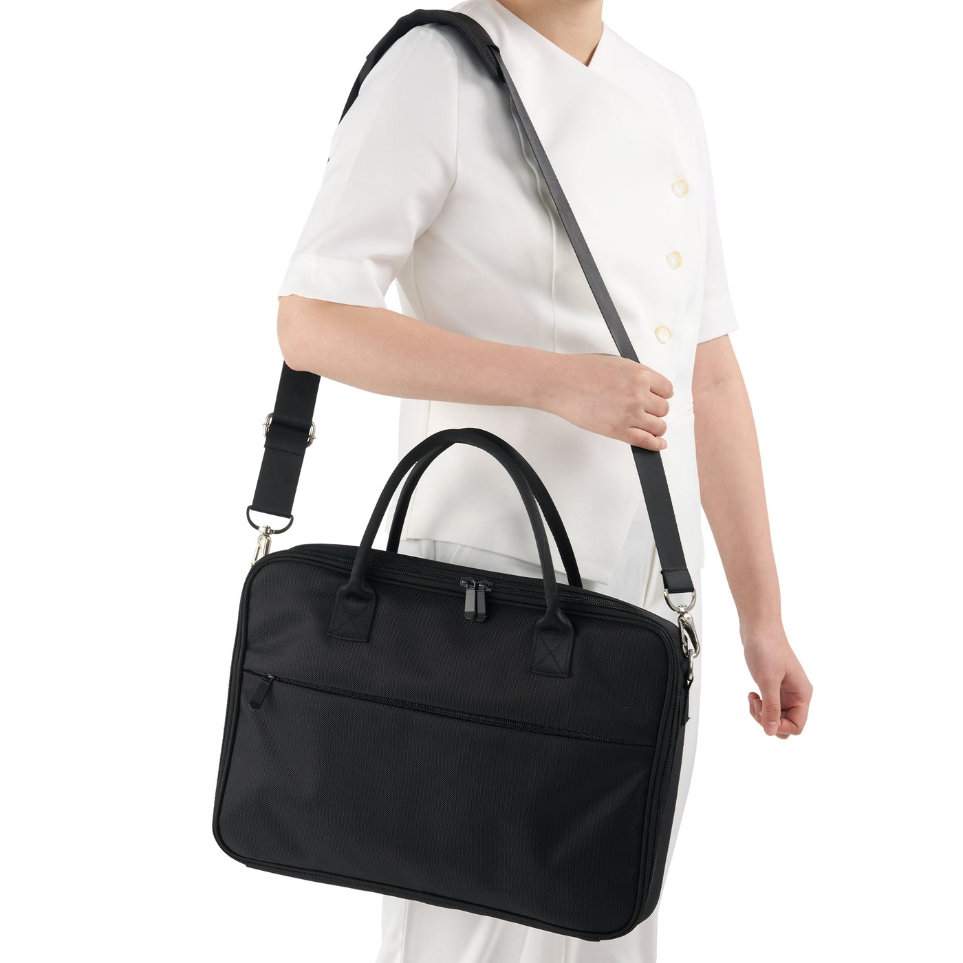 Person holding Master Massage Hot Stone Heater Bag on a white background