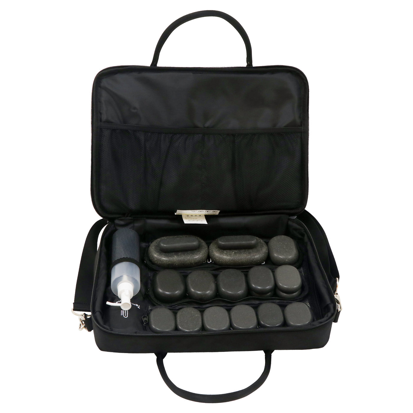 Black case with massage stones and pump on a white background