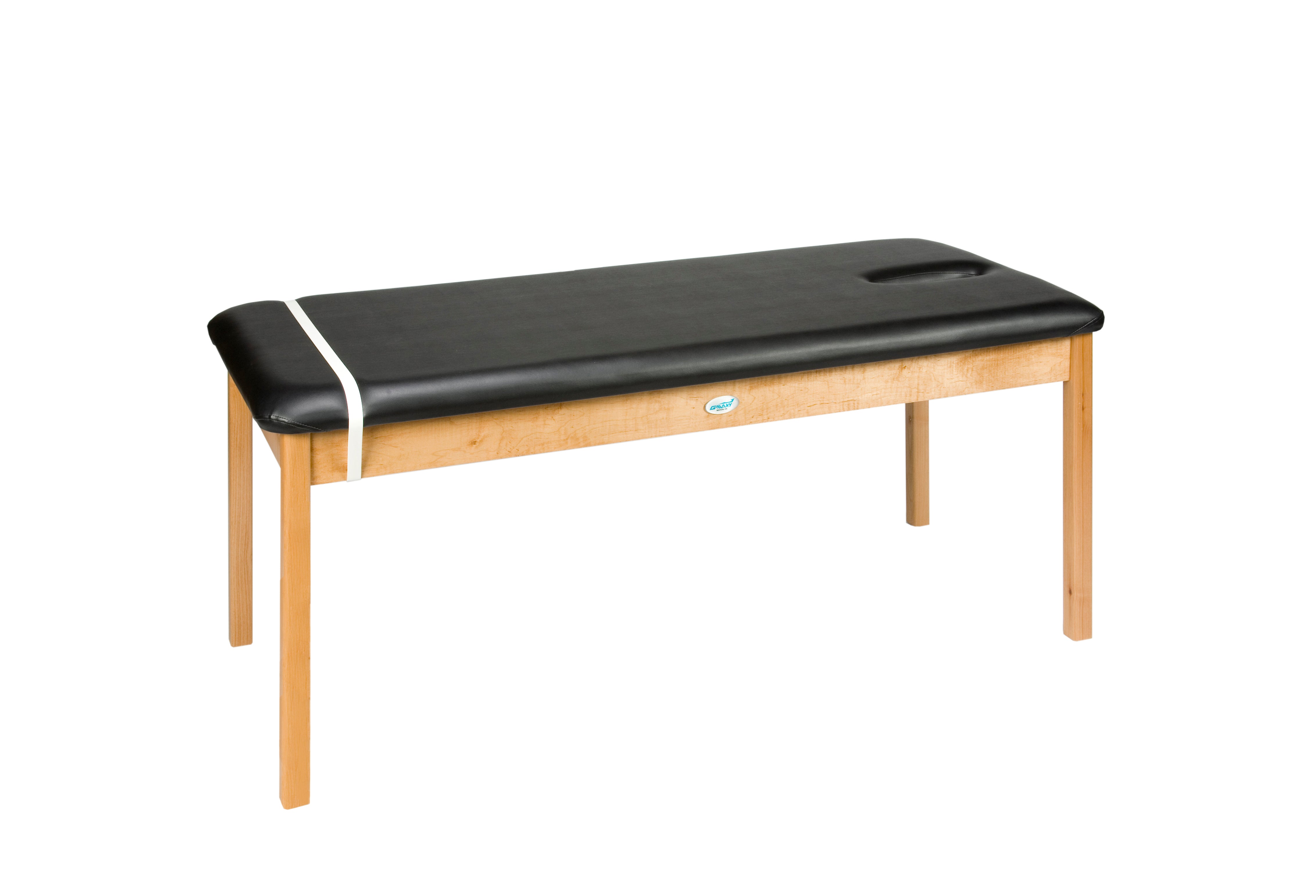 Galaxy Mfg 1989-30 treatment table with black cushion, wooden legs, and face hole at one end.