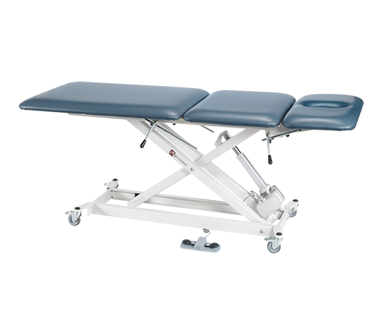 Armedica AM-SX3500 treatment table, blue padded, headrest, height adjustable, on wheels.