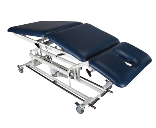 Armedica AM-BA 300 treatment table with powered height adjustment and casters.