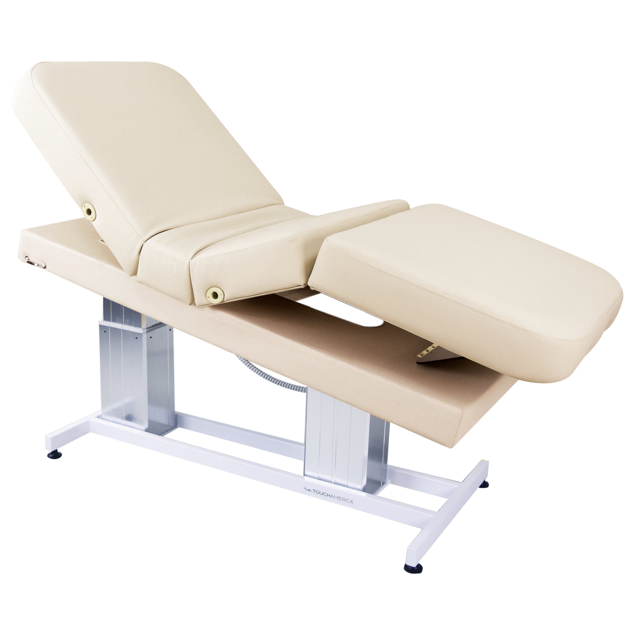 TouchAmerica ATLAS CLASSIC beige treatment table with cushion and double pedestal base.