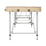 Master Massage Breeze ultralight beige aluminum massage table, seen from the foot end.