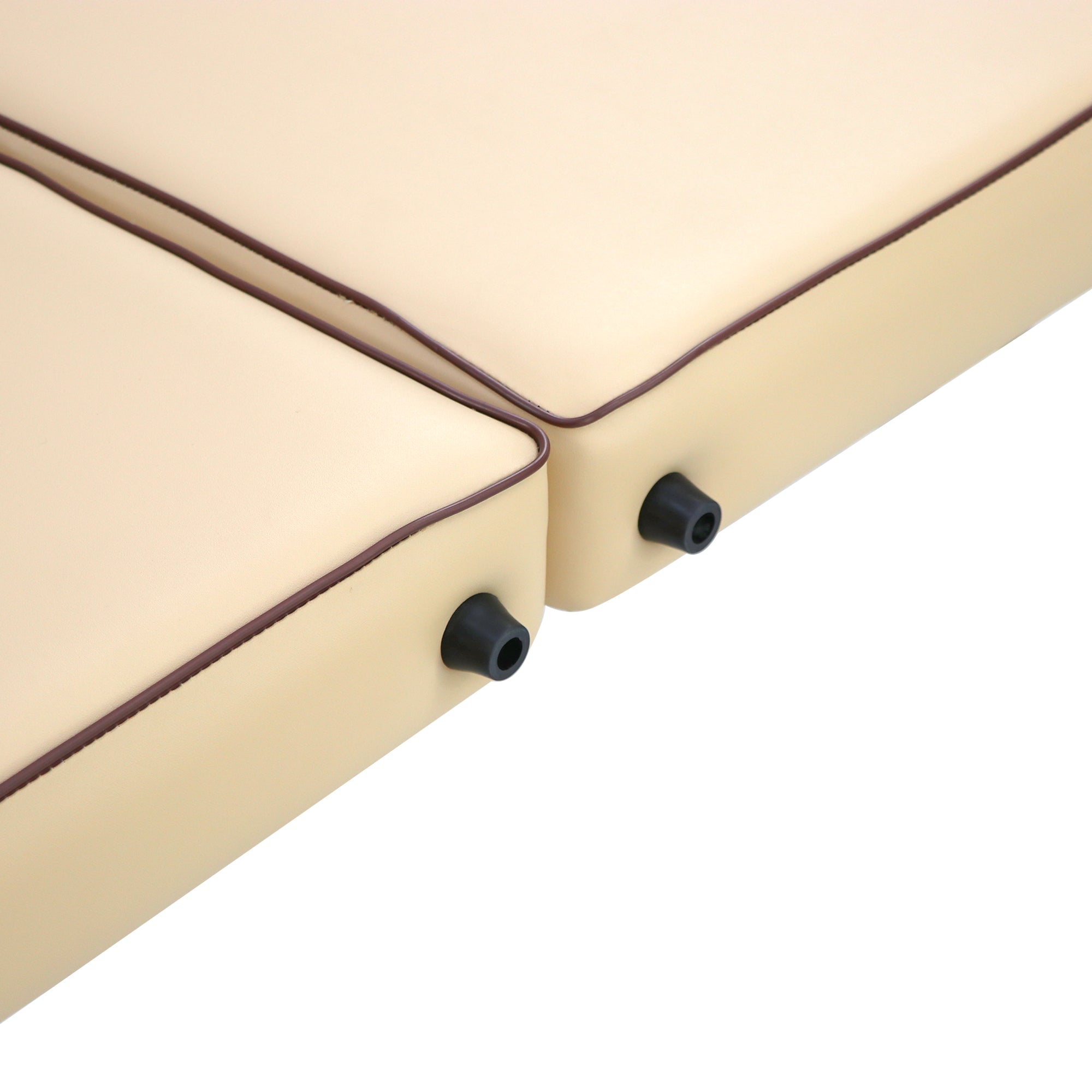 Close-up of two beige cushions with brown piping on the Master Massage Breeze Portable Table.