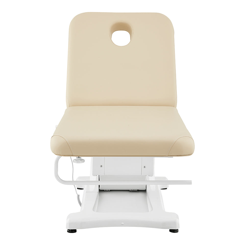 Serenity Electric Treatment Table DIR by DIR, beige, with headrest hole, front view, adjustable.